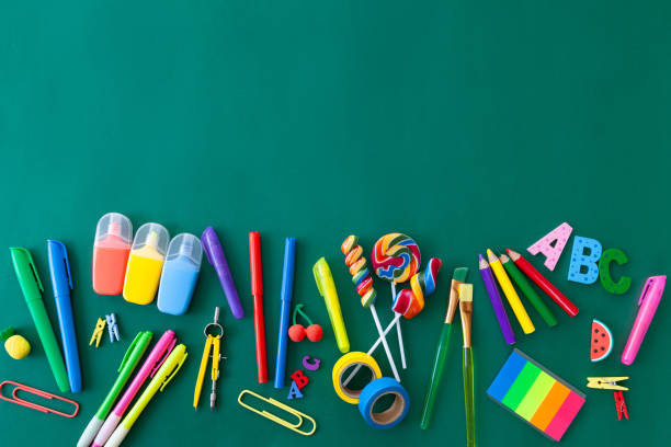 istock Cheerful background with school supplies 1166237801