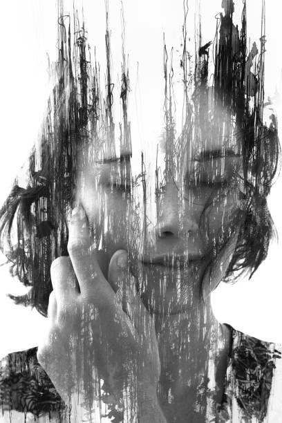 Paintography. Double Exposure portrait of a young beautiful woman with hand on face combined with hand drawn ink and pen drawing stock photo