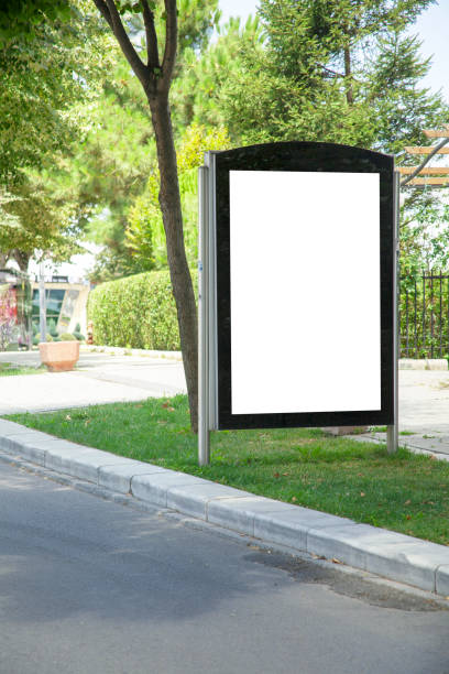 istock advertising board on asphalt road 1166244410