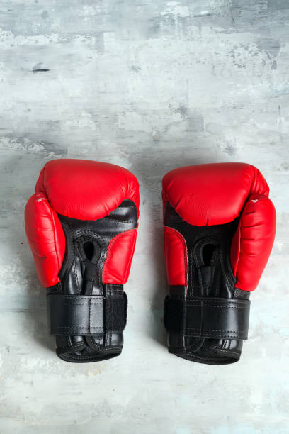 istock Pair red of boxing gloves on grey background, 1166247157