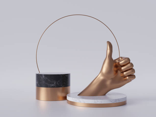 istock 3d render, golden hand thumb up, like gesture, black marble pedestal isolated on white background, best quality concept, gold round frame, blank cylinder podium, simple design, luxury minimal mockup 1166252297