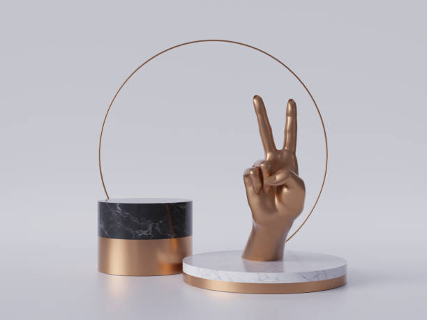 istock 3d render, golden hand, victory gesture, black marble pedestal isolated on white background, minimalist concept, gold round frame, blank cylinder podium, simple clean design, luxury minimal mockup 1166252535