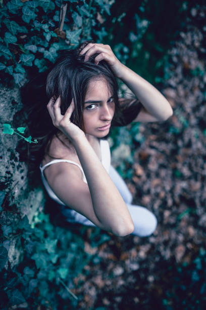 Cute Female Portrait In Dark Forest