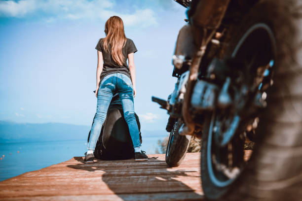 istock Couple Enjoying Nature While Traveling With A Motorcycle 1166253499