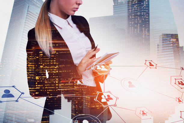 istock Woman with notebook in city, social network 1166255849