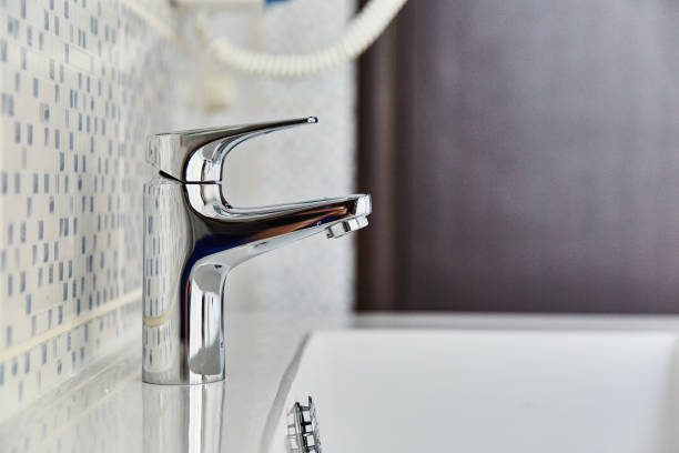 istock Bathroom interior with sink and faucet. 1166257794