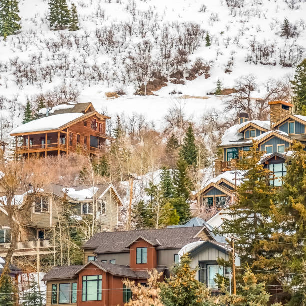 istock Square frame Multi storey residences built on a mountain blanketed with fresh snow in winter 1166257799