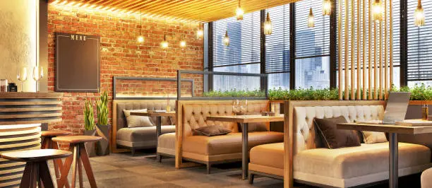 Photo of Modern cafe design interior with a brick wall. Loft design. Coffee shop, cafe.