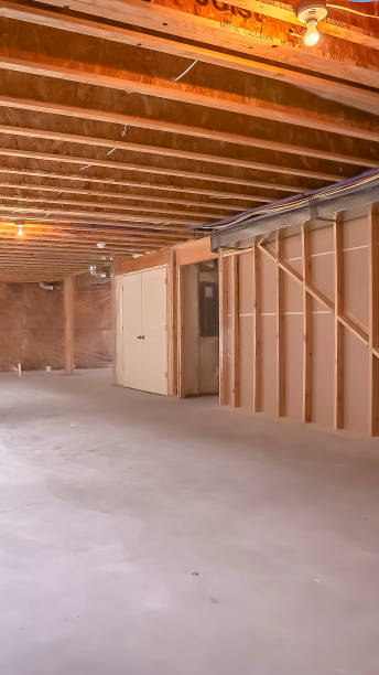 istock Vertical New home interior under construction with the wood framing visible 1166259139