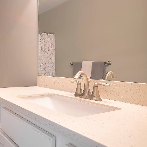 istock Square Home bathroom interior with dark gray tile floor and light gray wall 1166259214