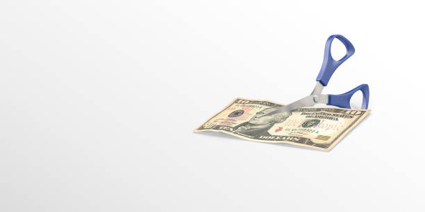 istock American Ten Dollar Bill is Cutting By A Scissors 1166260410