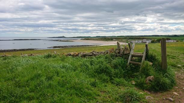 istock Stile on the coastal path looking towards Embleton Bay 1166261957
