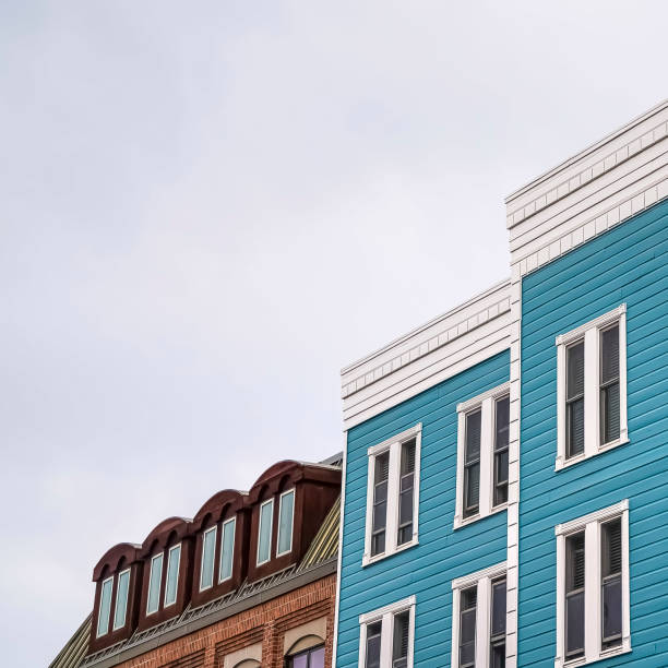 istock Square frame Residential building with blue exterior wall and vertical sliding windows 1166263206