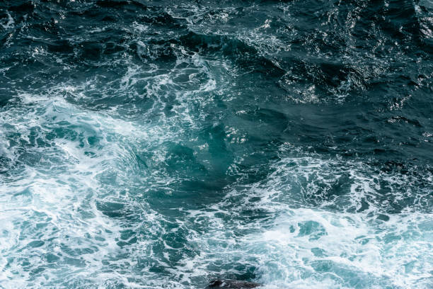 istock Water surface and splashing at the ocean for background 1166264027