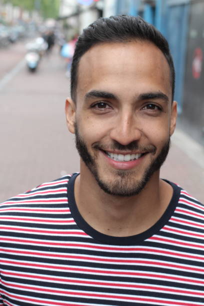 istock Happy ethnic man smiling close up 1166265233