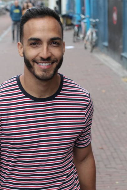 istock Good looking man outdoor portrait 1166265996