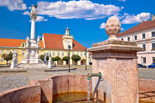 Old paved street and fountain in Tvrdja historic town of Osijek Old paved street and fountain in Tvrdja historic town of Osijek, Slavonija region of Croatia osijek photos stock pictures, royalty-free photos & images