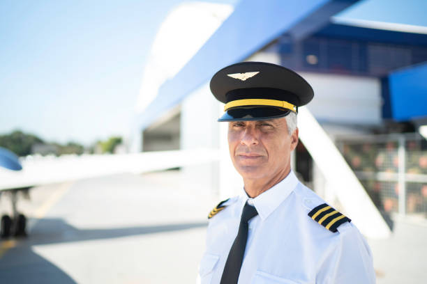 istock Portrait of airplane pilot looking at camera 1166270268