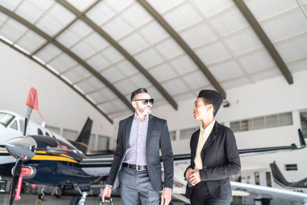 istock Coworkers talking in hangar 1166272179
