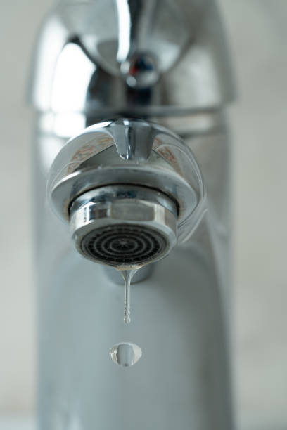 istock water drop dripping from the tap 1166276446