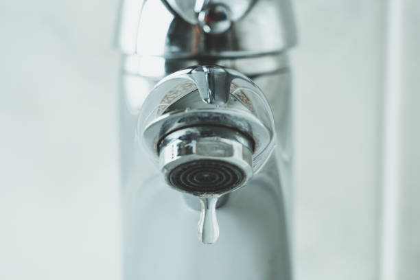 istock water drop dripping from the tap 1166277051