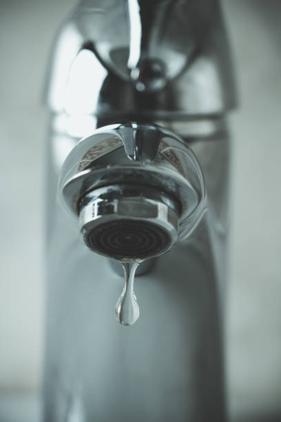 istock water drop dripping from the tap 1166277243