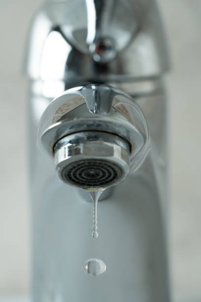 istock water drop dripping from the tap 1166277437