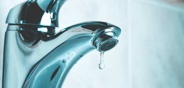 istock water drop dripping from the tap 1166277688