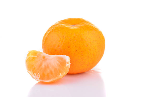 istock Orange mandarin or tangerine fruit isolated on white background 1166278187