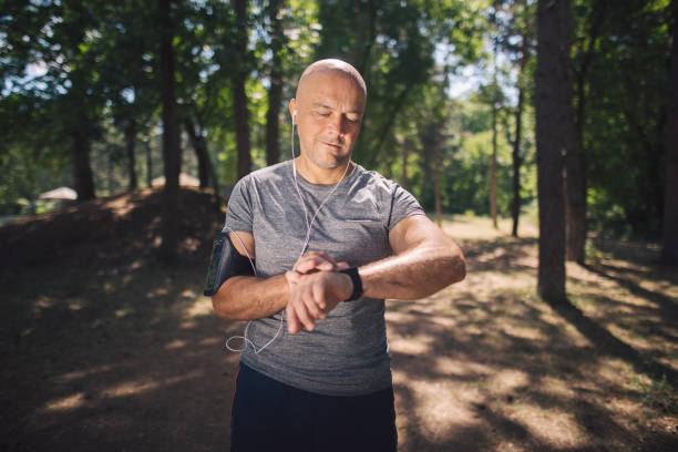 istock Running mature man checking the stopwatch 1166279221