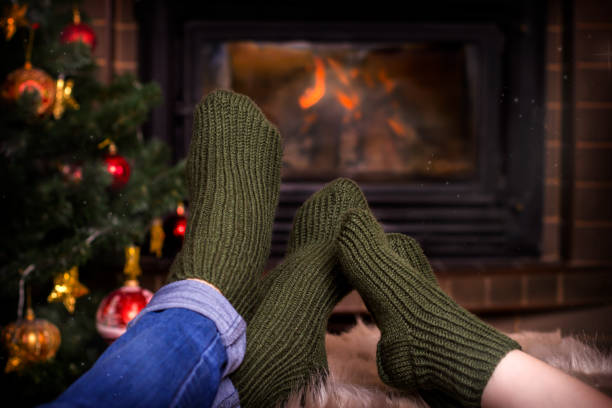 istock Mother And Child  in woolen socks 1166280042