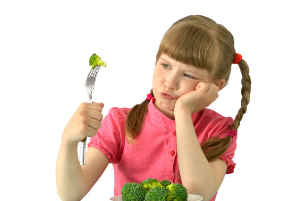 istock child, kid, does not like broccoli white isolated background 1166281172