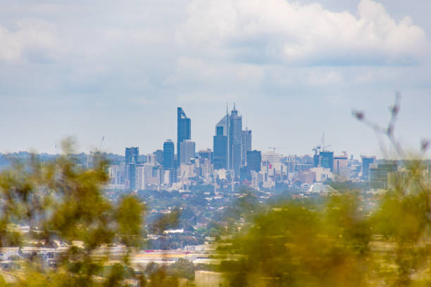 Perth, Western Australia, Australia - March 20 2024: Business and downtown district seen from Kings Park and Botanic Garden. Leading lines rails towards city skyline