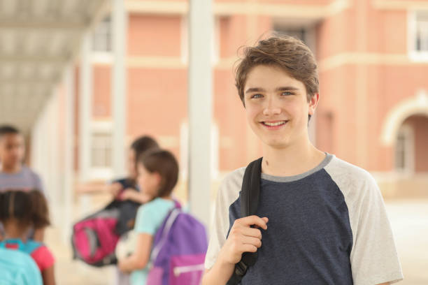 istock Latin descent, junior high age boy on school campus. 1166286504