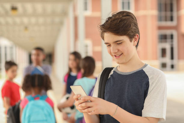 istock Latin descent, junior high age boy on school campus. 1166286521