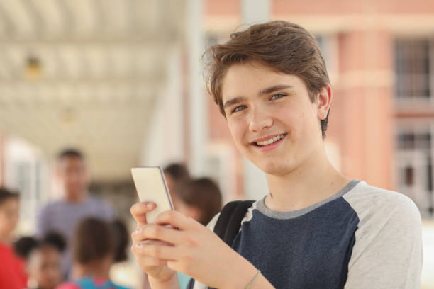 istock Latin descent, junior high age boy on school campus. 1166286526
