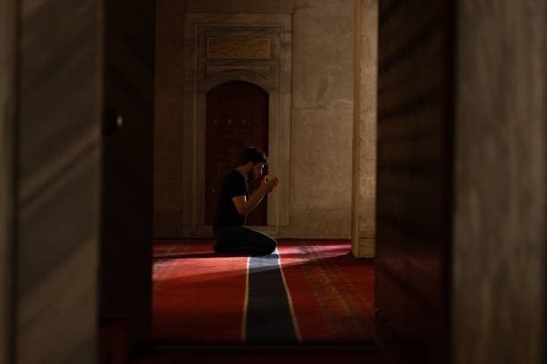 istock Muslim Man Praying in Mosque 1166287227