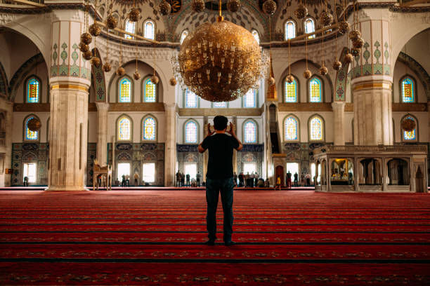 istock Muslim Man Praying in Mosque 1166287663