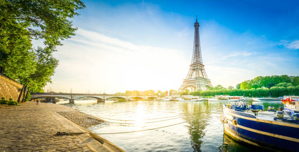 istock eiffel tour over Seine river 1166288274