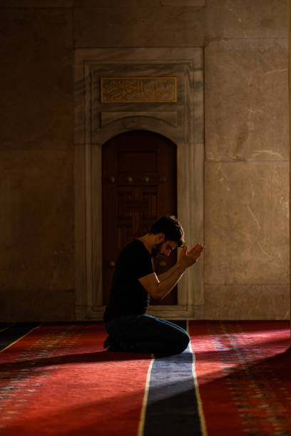 istock Muslim Man Praying in Mosque 1166288352