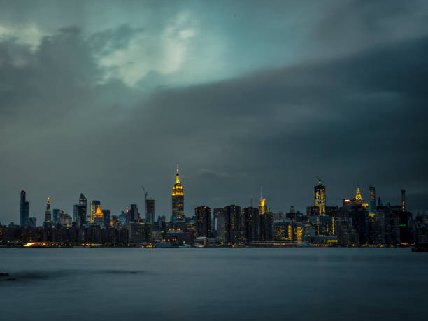 istock Evening Sky Over Manhattan Cityscape 1166289334