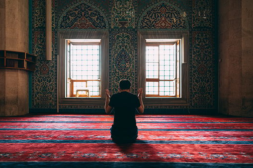 Muslim Man Praying in Mosque