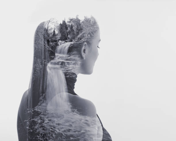 istock Multiple Exposure of young woman, river and waterfall 1166291275