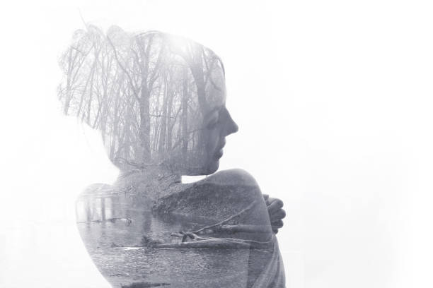 istock Multiple exposure of a young woman, forest and river. 1166291336
