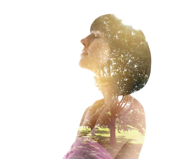 istock Multiple exposure of a young woman and public park 1166291346