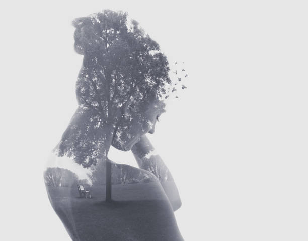 istock Multiple exposure of a young woman and public park 1166291390