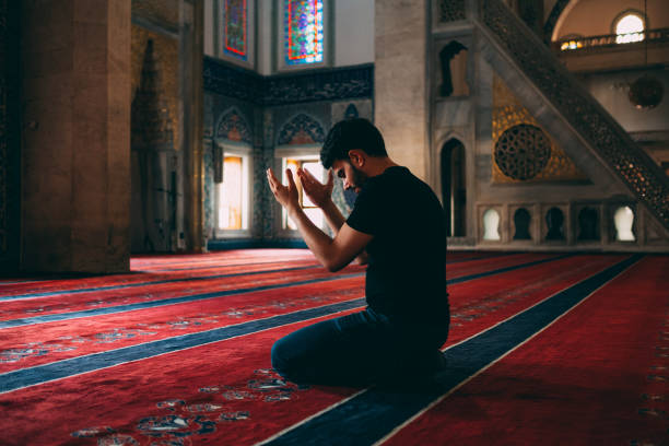 istock Muslim Man Praying in Mosque 1166291974