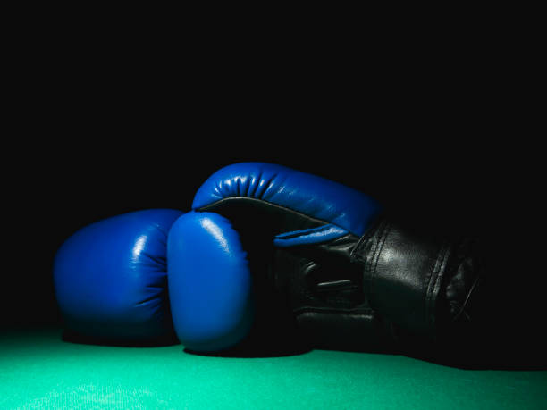 istock Boxing gloves on the black background 1166292830