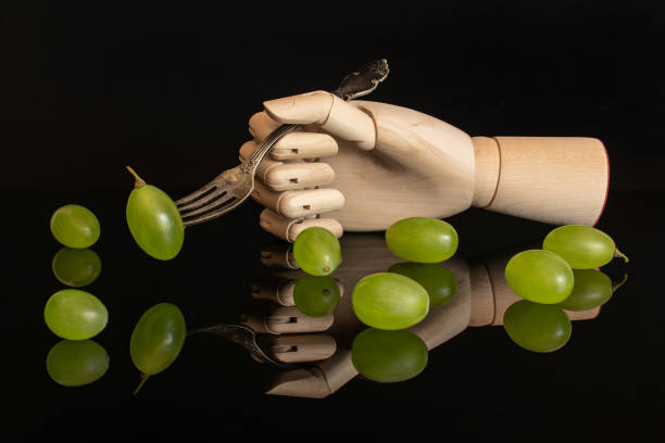 fresh green grape isolated on black glass - luminant imagens e fotografias de stock