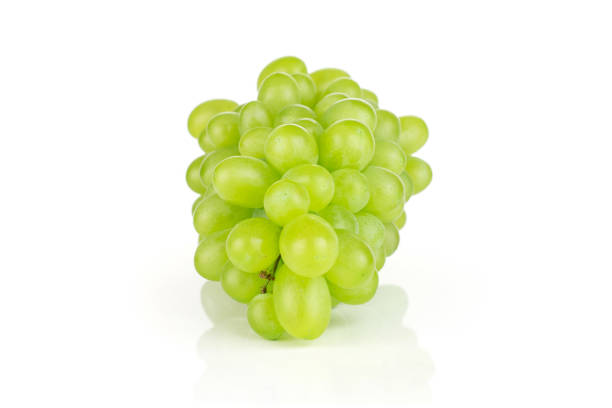 fresh green grape isolated on white - luminant imagens e fotografias de stock